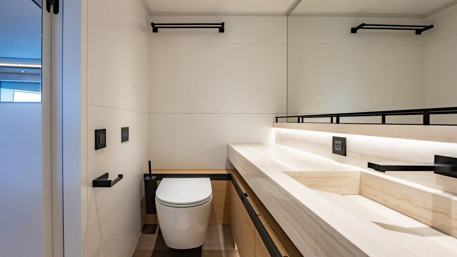 The yacht's bathroom features a sleek, modern design with clean lines and high-quality fixtures. aboard RESOLUTE Yacht for Sale