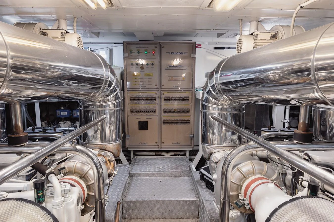 The engine room showcases advanced machinery and polished metal components. aboard LADY MAUREEN Yacht for Sale