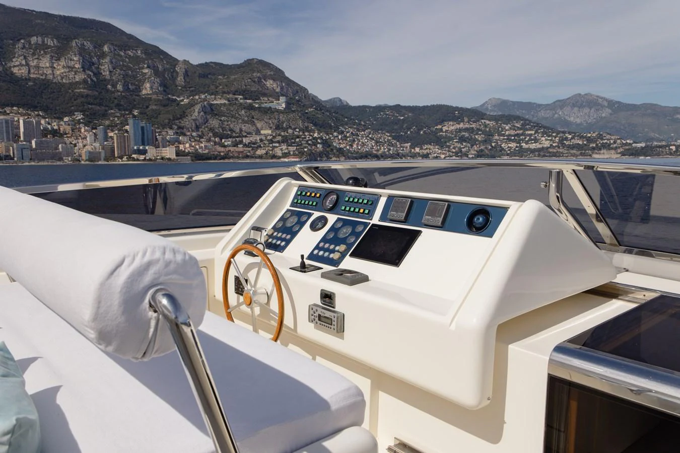 The helm station offers a commanding view with state-of-the-art navigation equipment and a comfortable seating area. aboard LADY MAUREEN Yacht for Sale
