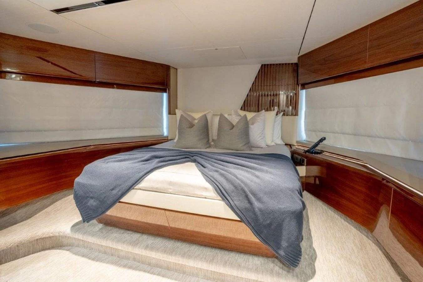 The master stateroom offers a cozy and elegant retreat with a plush bed and stylish decor. aboard KAOS Yacht for Sale