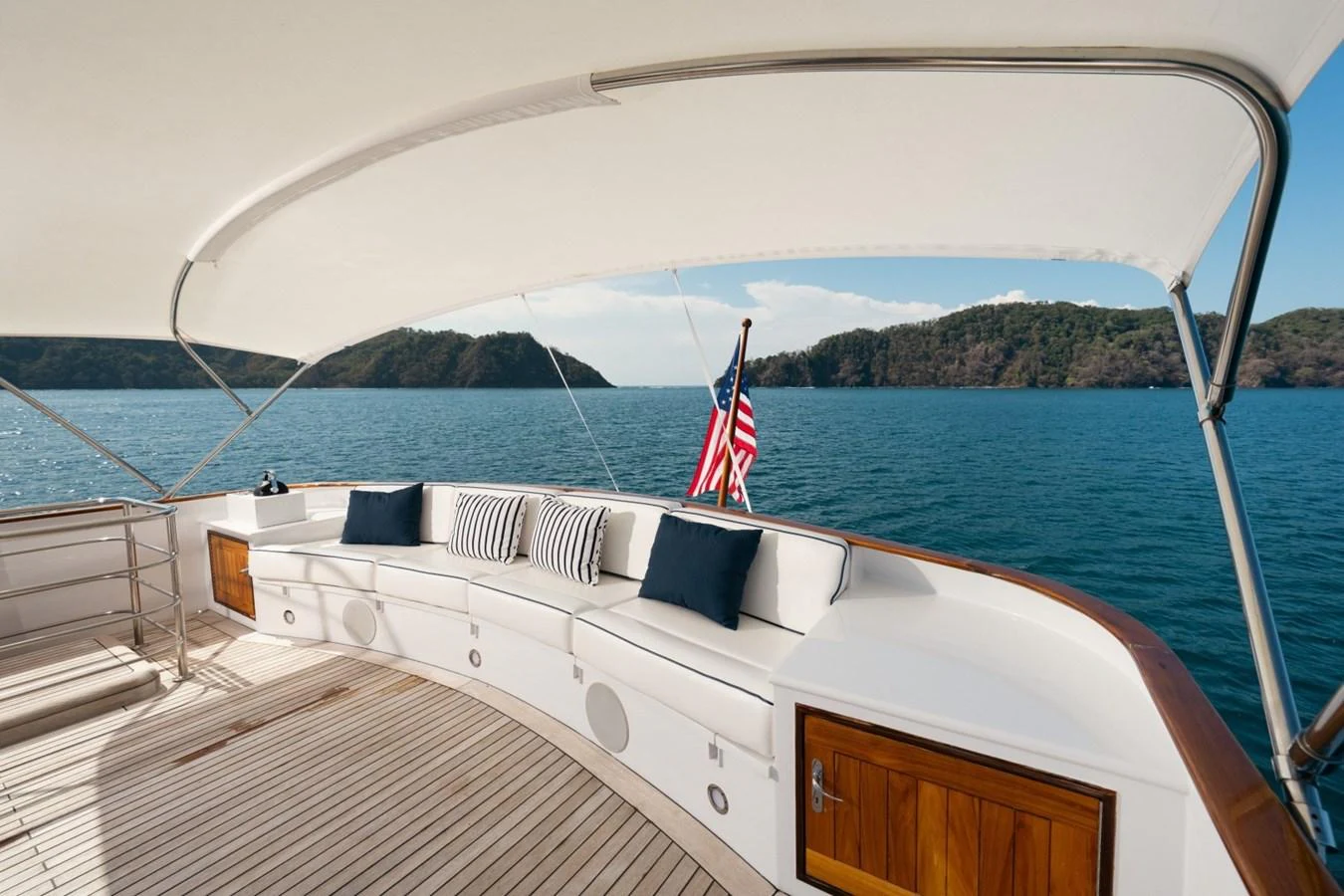 The aft deck offers a spacious seating area with a stunning view of the surrounding waters. aboard PASSAGE Yacht for Sale