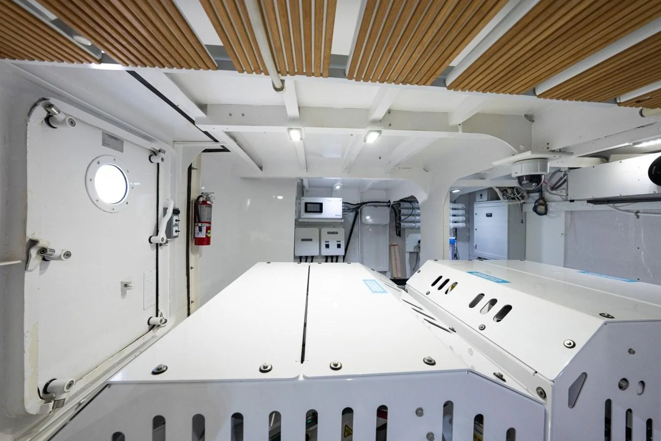 The engine room is equipped with advanced machinery and a clean, organized layout. aboard PASSAGE Yacht for Sale