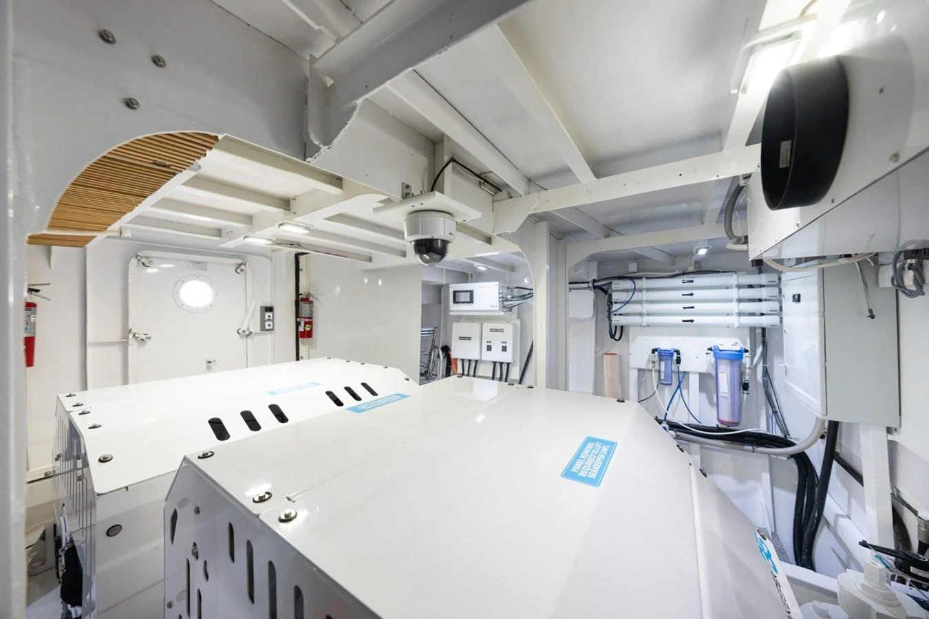 The image showcases the yacht's well-equipped engine room with advanced machinery and systems. aboard PASSAGE Yacht for Sale