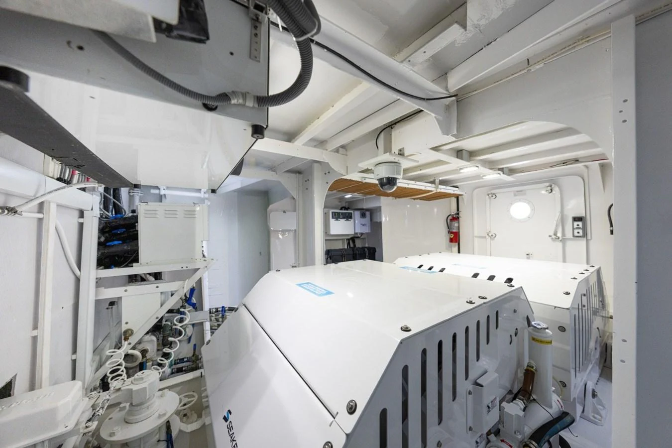 The image showcases the clean and well-organized engine room of the yacht. aboard PASSAGE Yacht for Sale