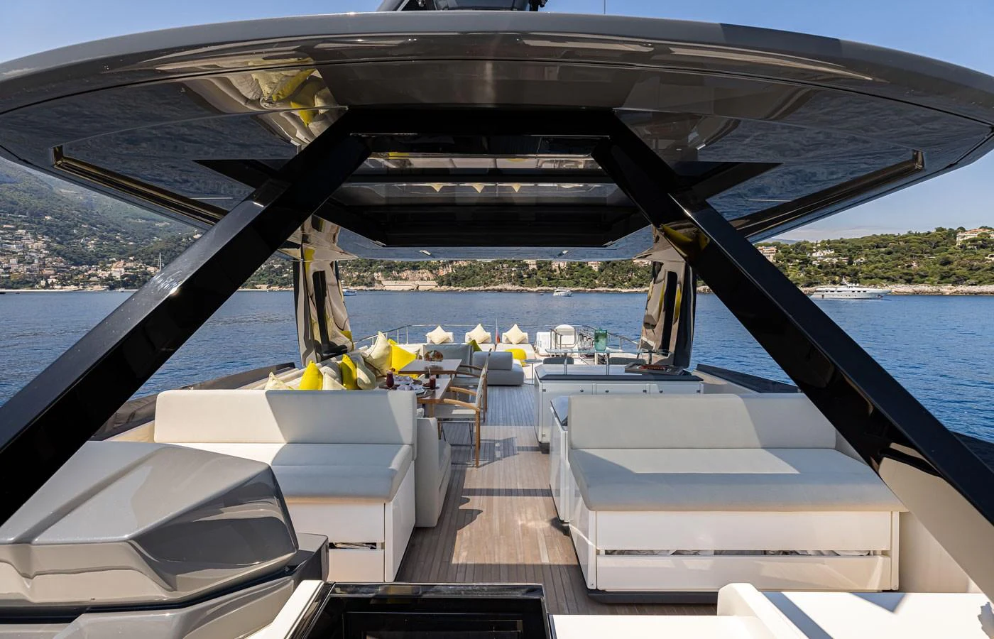 The aft deck offers spacious seating and stunning views of the surrounding waters. aboard ALEGRIA II Yacht for Sale