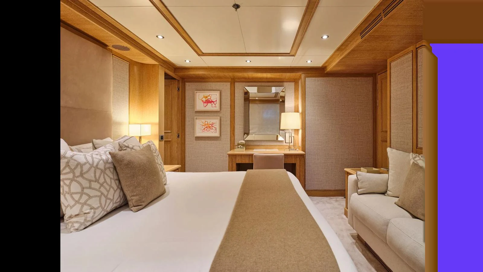 The master stateroom features a luxurious bed, elegant decor, and ample lighting. aboard THEOLINA Yacht for Sale