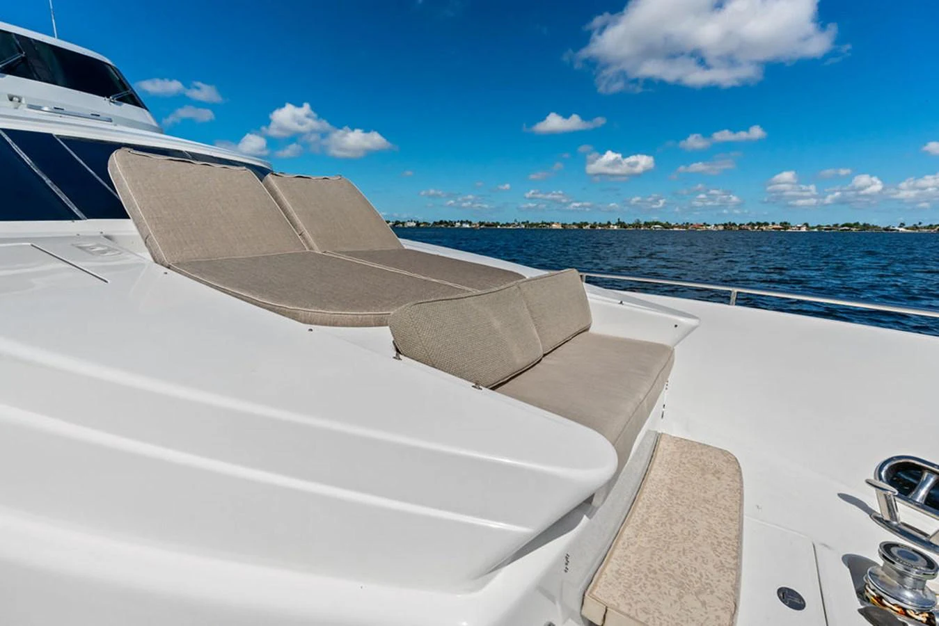 The foredeck features comfortable sun loungers with a stunning view of the water. aboard BABE Yacht for Sale