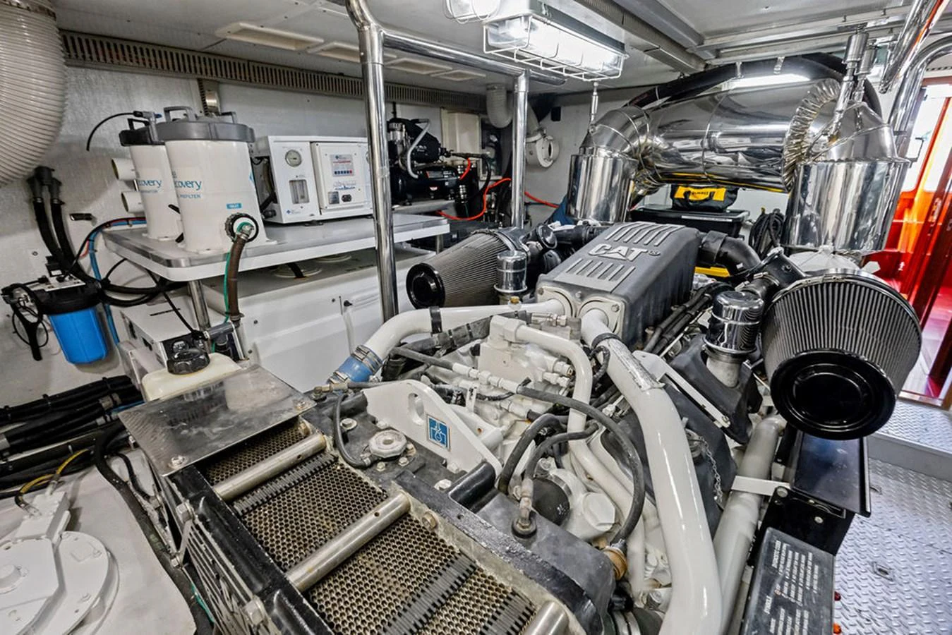 The image showcases the well-maintained engine room of the yacht, highlighting its advanced machinery and clean setup. aboard BABE Yacht for Sale
