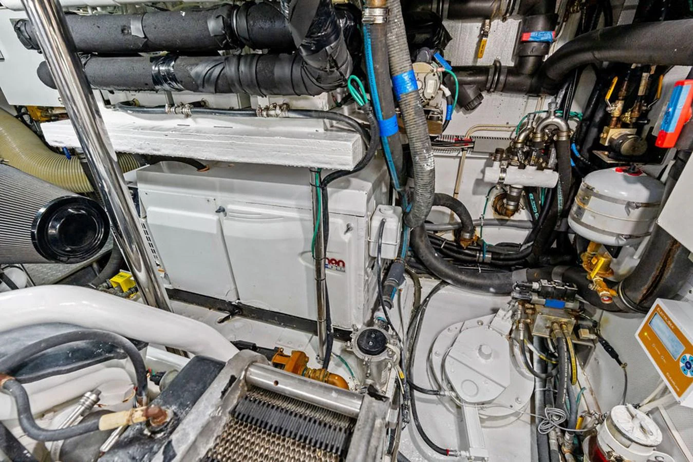 The image showcases the intricate and well-maintained engine room of the yacht. aboard BABE Yacht for Sale