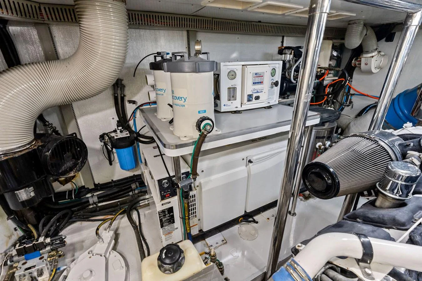 The image showcases the yacht's well-maintained engine room with various machinery and equipment. aboard BABE Yacht for Sale