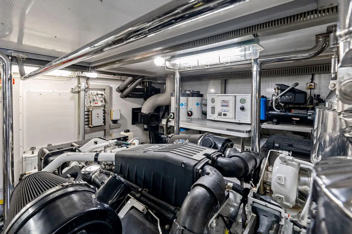 The image showcases the well-organized and high-tech engine room of the yacht. aboard BABE Yacht for Sale