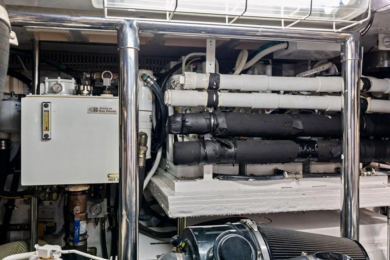 The image showcases the intricate details of the yacht's engine room, highlighting the technical components and machinery. aboard BABE Yacht for Sale