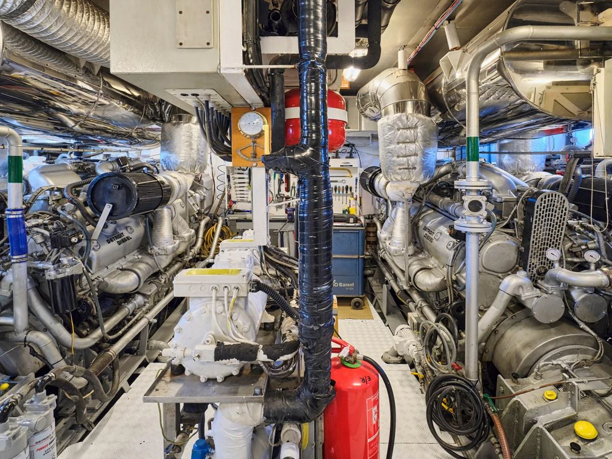 The image showcases the yacht's meticulously maintained engine room with advanced machinery and equipment. aboard RESINA Yacht for Sale
