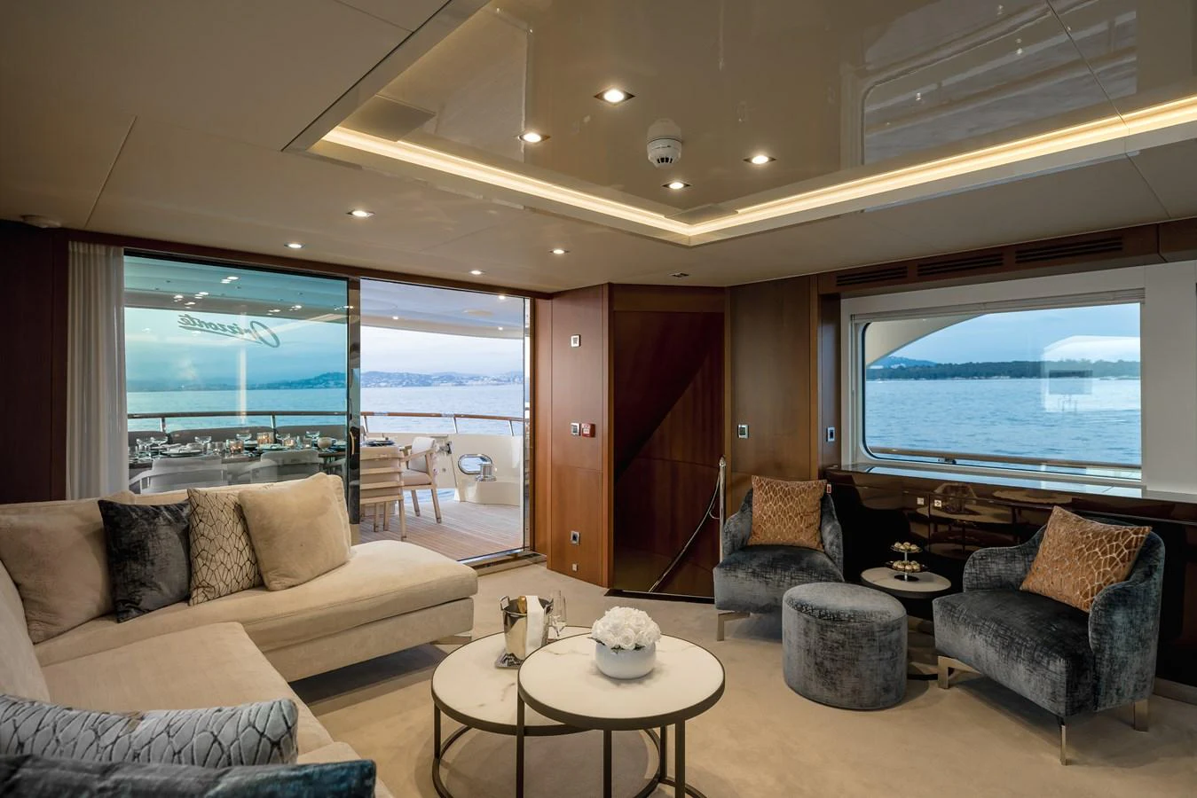 The salon offers a luxurious and comfortable space with a stunning view of the sea. aboard ORIZZONTE Yacht for Sale