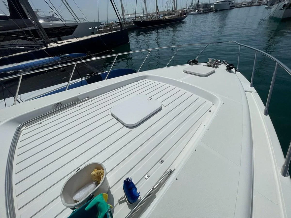The foredeck of the yacht offers a spacious and clean area, perfect for sunbathing or enjoying the view. aboard MANGUSTA 72 Yacht for Sale