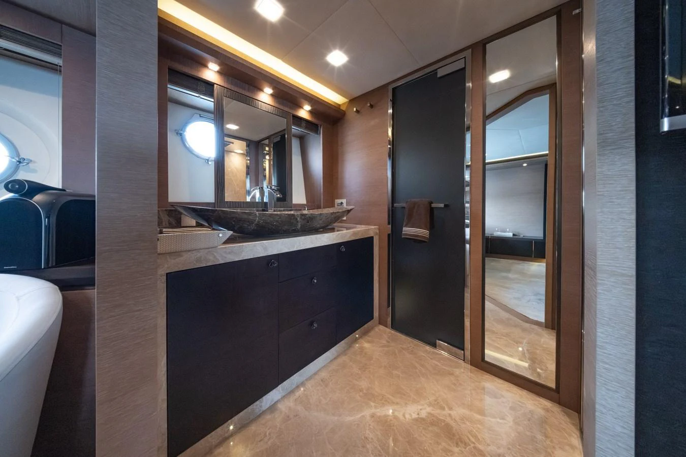 The yacht's bathroom features elegant fixtures and a modern design. aboard BELLA LUNA Yacht for Sale