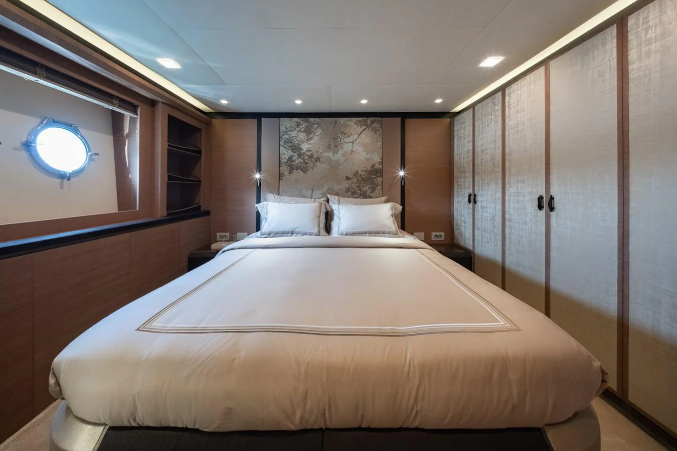 A luxurious stateroom featuring a large bed and elegant decor. aboard BELLA LUNA Yacht for Sale