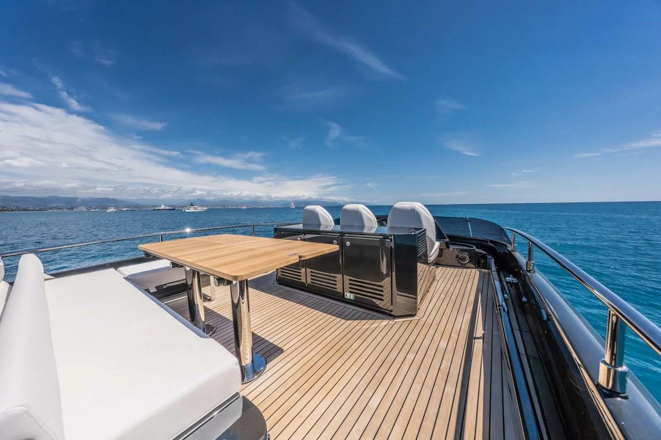 The flybridge offers a spacious and luxurious outdoor area with stunning sea views. aboard REEMA Yacht for Sale