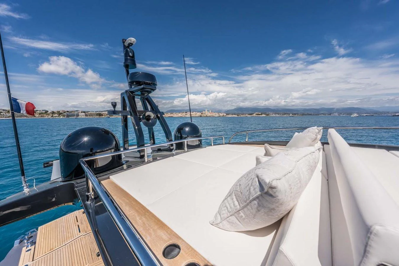 The sundeck offers a luxurious lounging area with plush cushions and panoramic ocean views. aboard REEMA Yacht for Sale