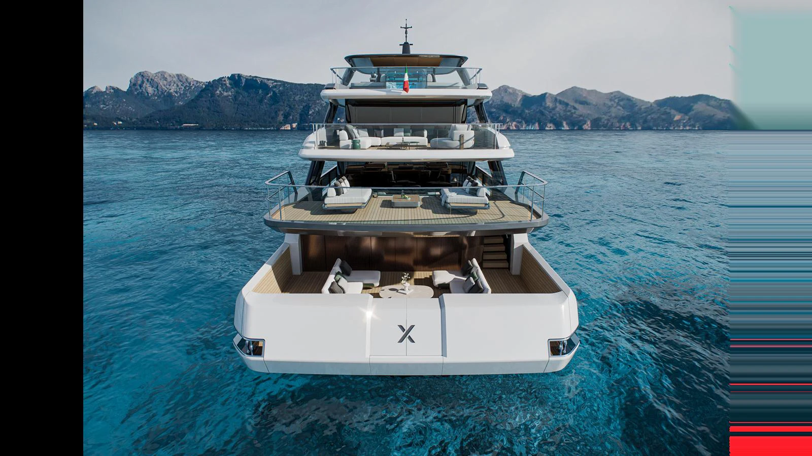 A luxurious yacht with multiple decks is anchored in a serene, clear blue sea with a mountainous backdrop. aboard X130 TRIPLEX Yacht for Sale