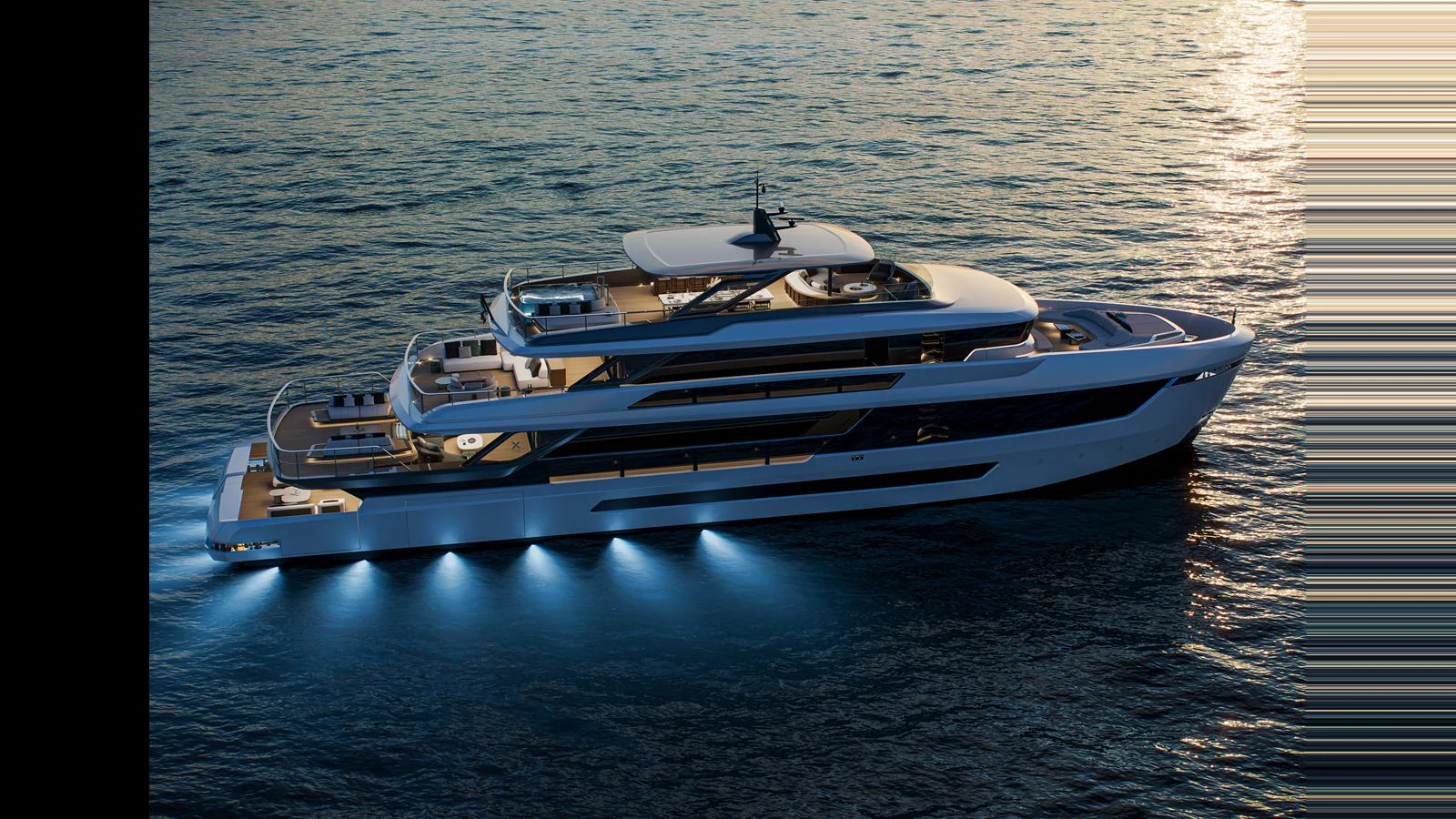 A sleek and modern yacht glides through the water, illuminated by underwater lights. aboard X130 TRIPLEX Yacht for Sale