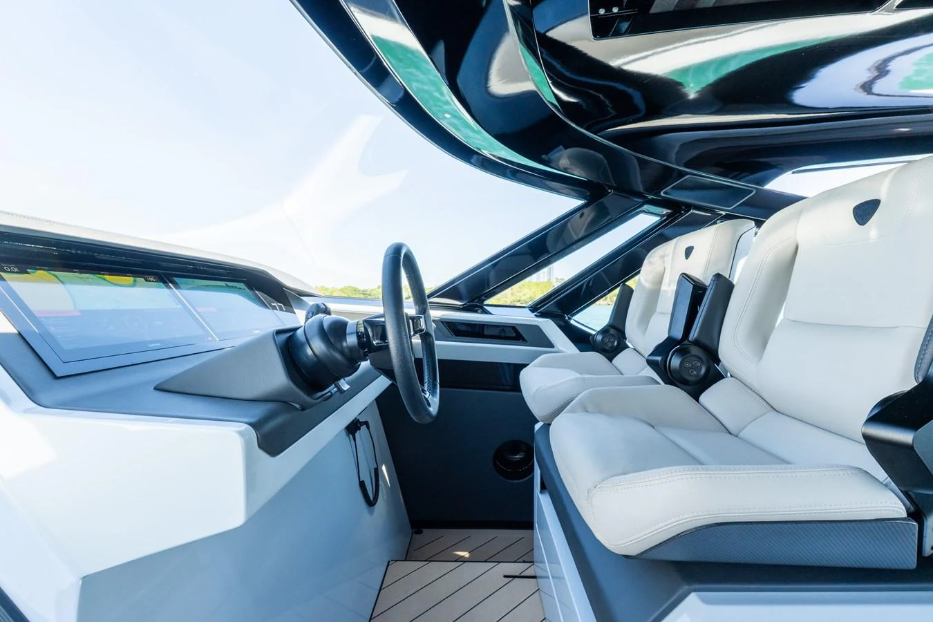 The helm features sleek, modern design with comfortable seating and advanced navigation equipment. aboard CASA BRI MARE Yacht for Sale