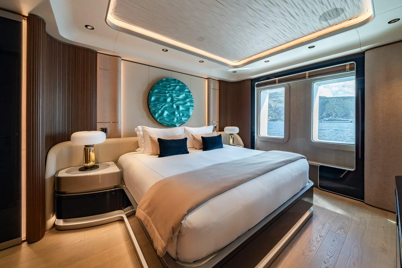 The master stateroom offers a luxurious and serene retreat with a large bed and scenic views. aboard MALIA Yacht for Sale