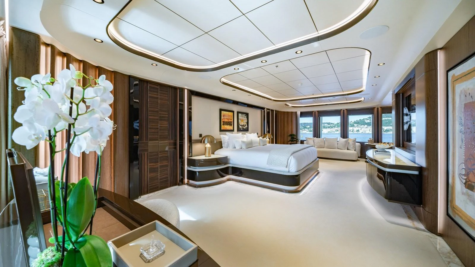 The master stateroom exudes luxury with its spacious layout, elegant decor, and panoramic windows. aboard MALIA Yacht for Sale