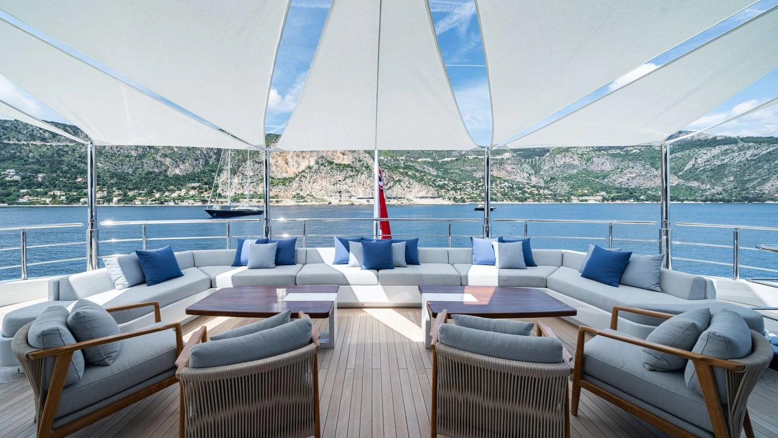The aft deck offers a spacious and inviting seating area with stunning views of the surrounding waters. aboard MALIA Yacht for Sale