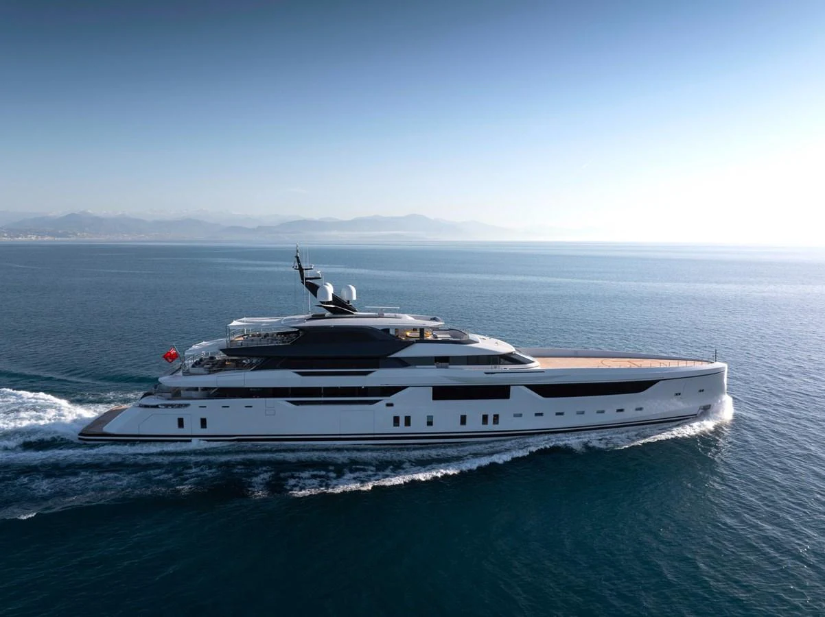 A sleek and modern yacht glides gracefully across the open sea. aboard MALIA Yacht for Sale