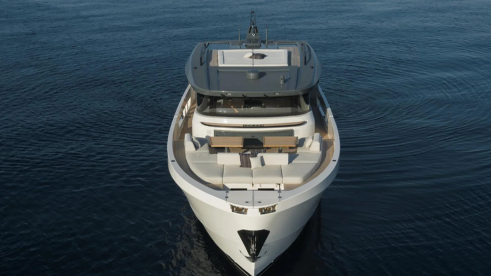 The yacht is captured head-on, showcasing its sleek design and spacious deck. aboard BARIC Yacht for Sale