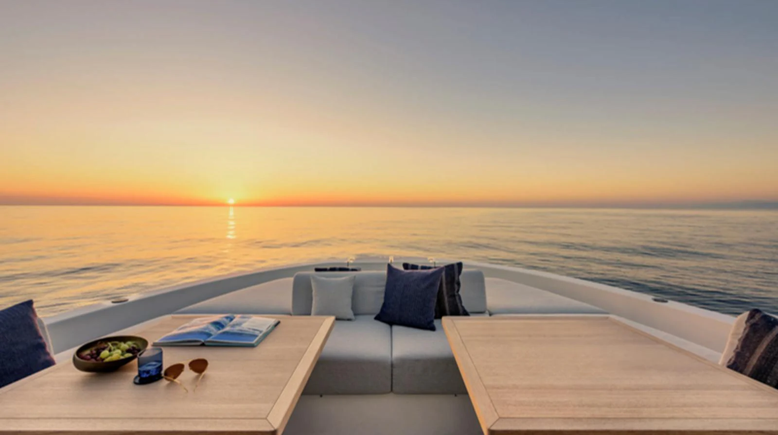 The foredeck offers a serene setting with comfortable seating and tables, perfect for enjoying the sunset. aboard BARIC Yacht for Sale