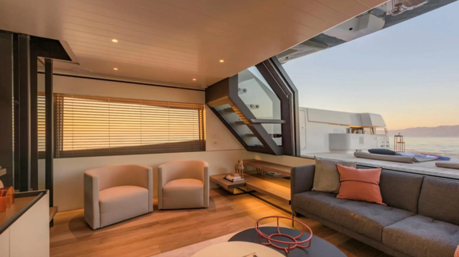 The yacht's interior features a modern and comfortable living area with ample seating and large windows offering stunning views. aboard BARIC Yacht for Sale