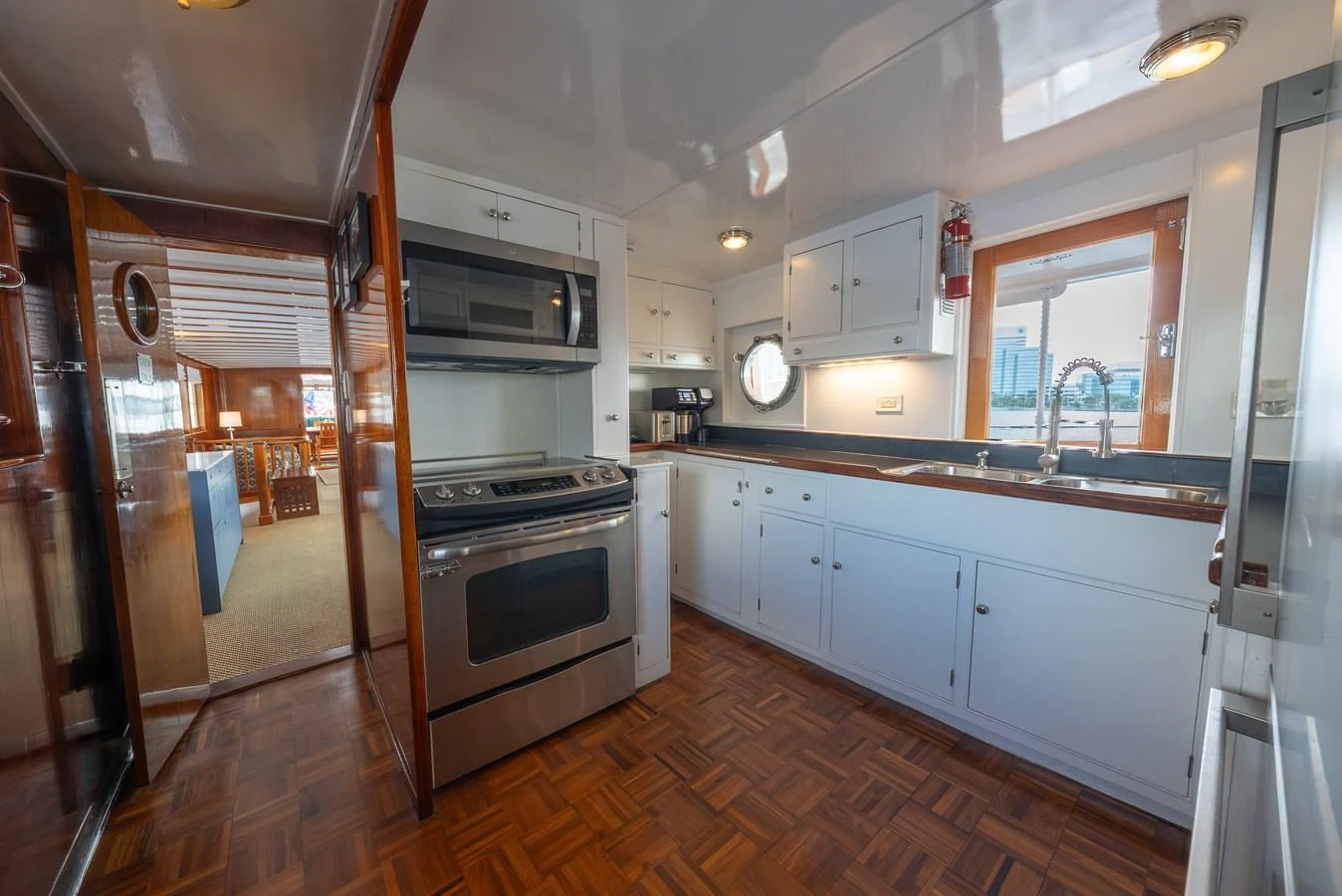 A well-appointed galley with modern appliances and ample counter space. aboard INNISFAIL Yacht for Sale