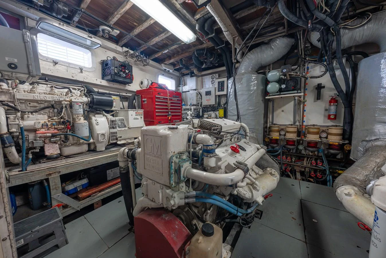 The engine room showcases the yacht's powerful machinery and well-organized systems. aboard INNISFAIL Yacht for Sale