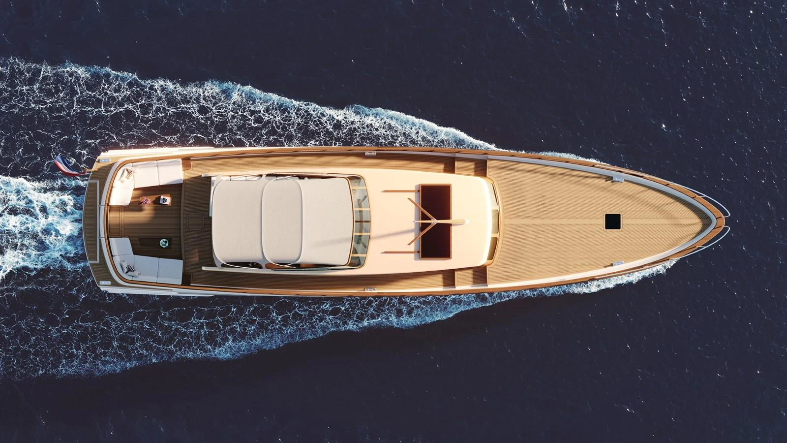 A sleek yacht glides through the water, showcasing its elegant design from an aerial perspective. aboard FEADSHIP NEW CLASSIC Yacht for Sale