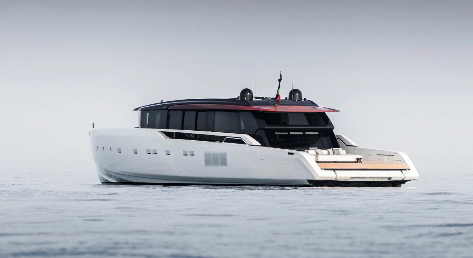 A sleek and modern yacht glides gracefully on calm waters, showcasing its contemporary design and luxurious amenities. aboard STEEL IT Yacht for Sale