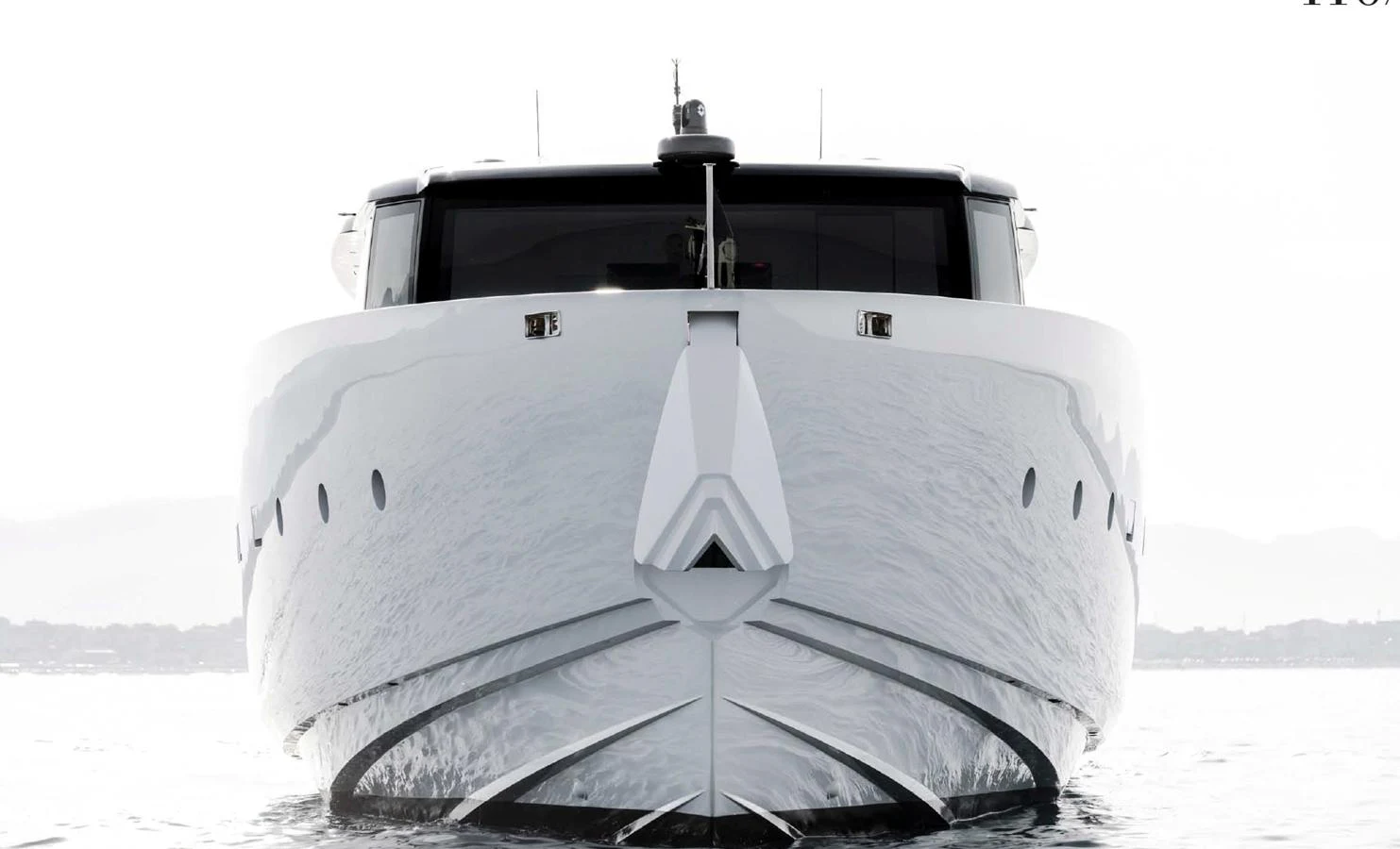 A sleek and modern yacht is captured head-on, showcasing its impressive design and craftsmanship. aboard STEEL IT Yacht for Sale