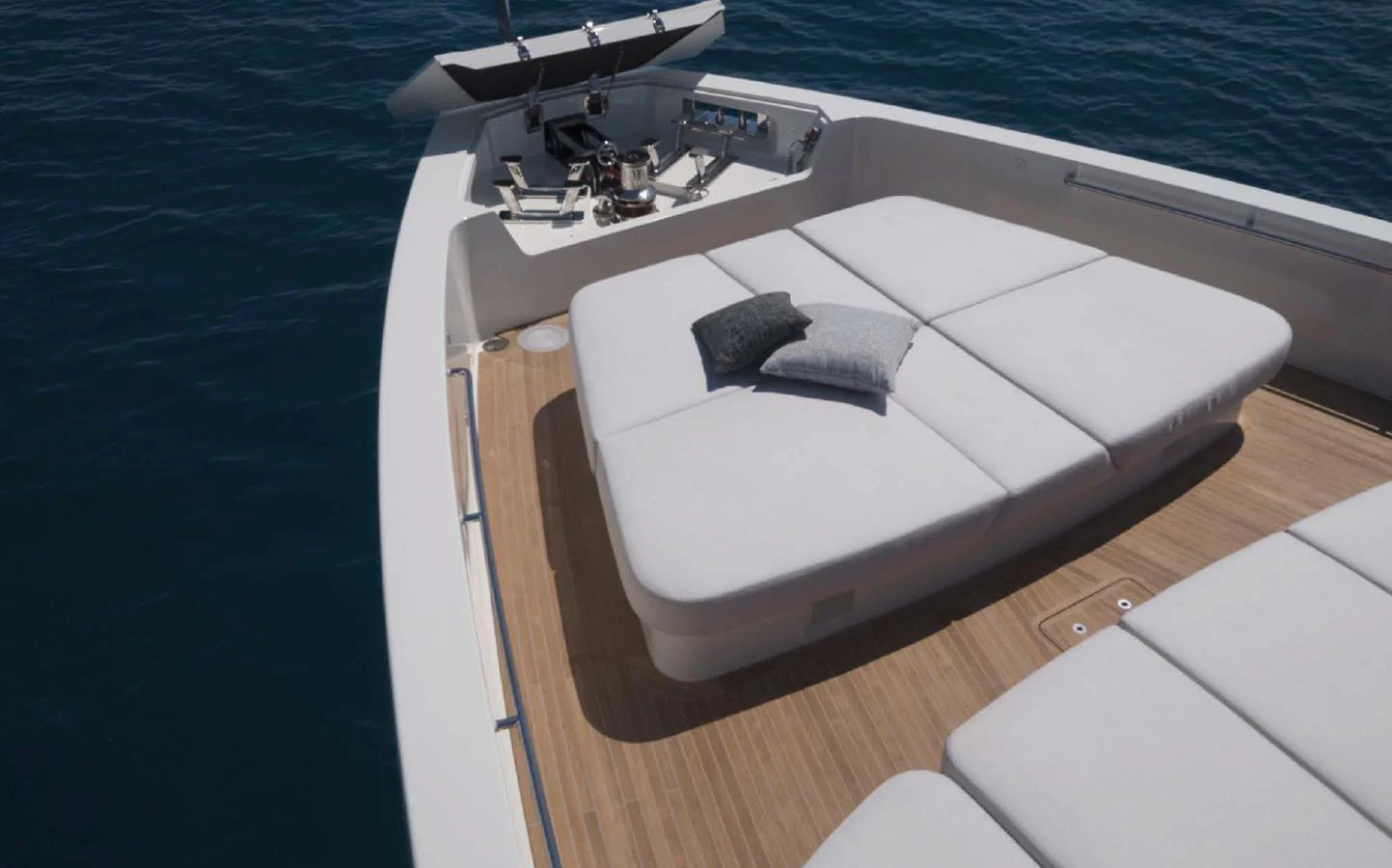 The foredeck features luxurious sun pads with plush cushions for ultimate relaxation. aboard STEEL IT Yacht for Sale