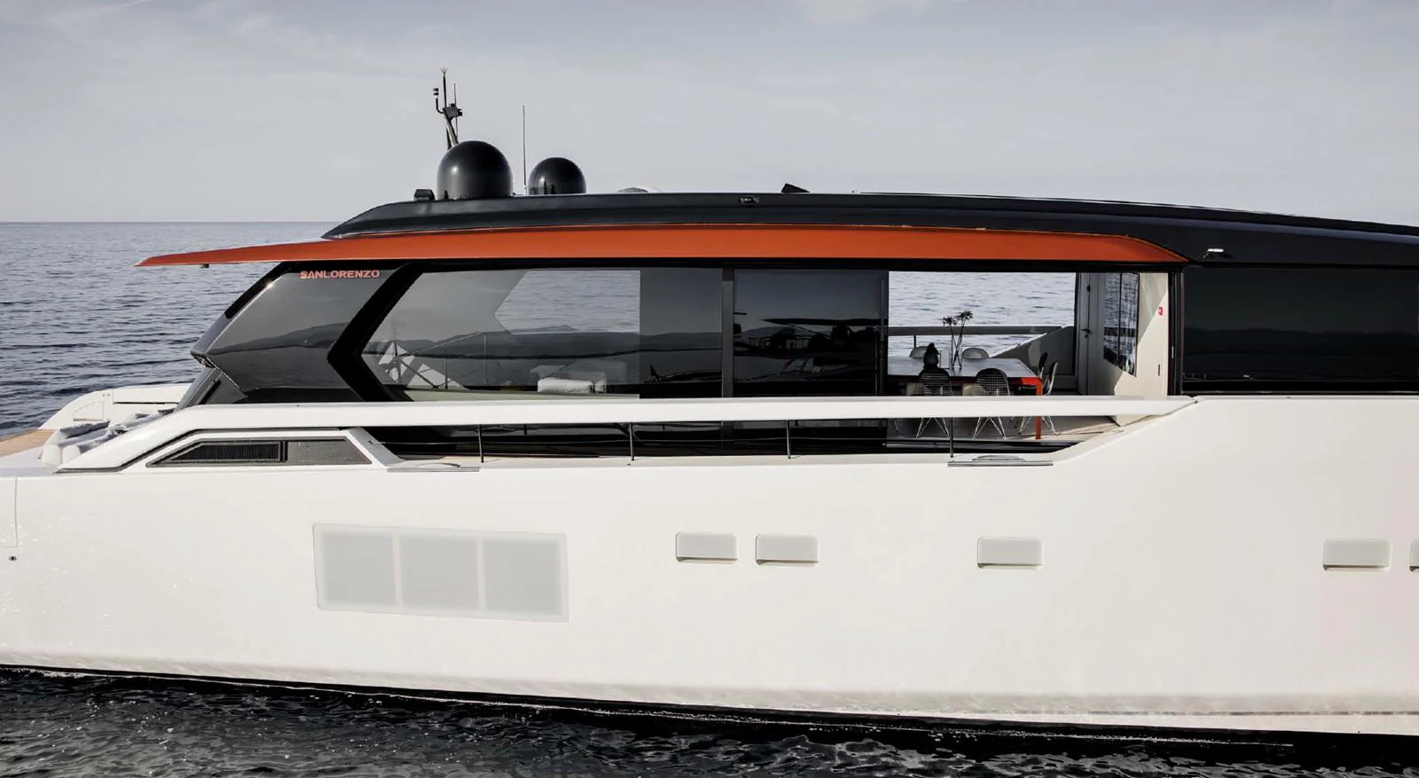 A sleek and modern yacht with a streamlined profile cruising on calm waters. aboard STEEL IT Yacht for Sale