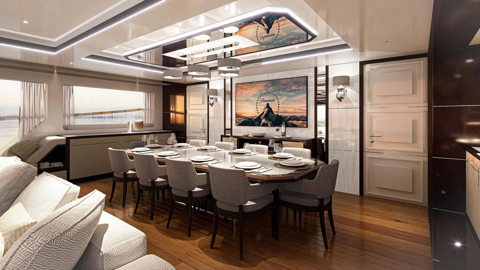 The yacht's dining area features a large table with elegant seating, surrounded by luxurious decor and ambient lighting. aboard FREEDOM Yacht for Sale