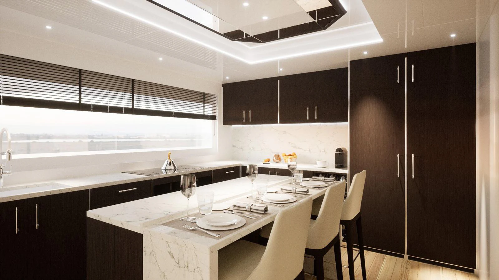 The yacht's galley features a modern design with sleek cabinetry and a spacious dining area. aboard FREEDOM Yacht for Sale