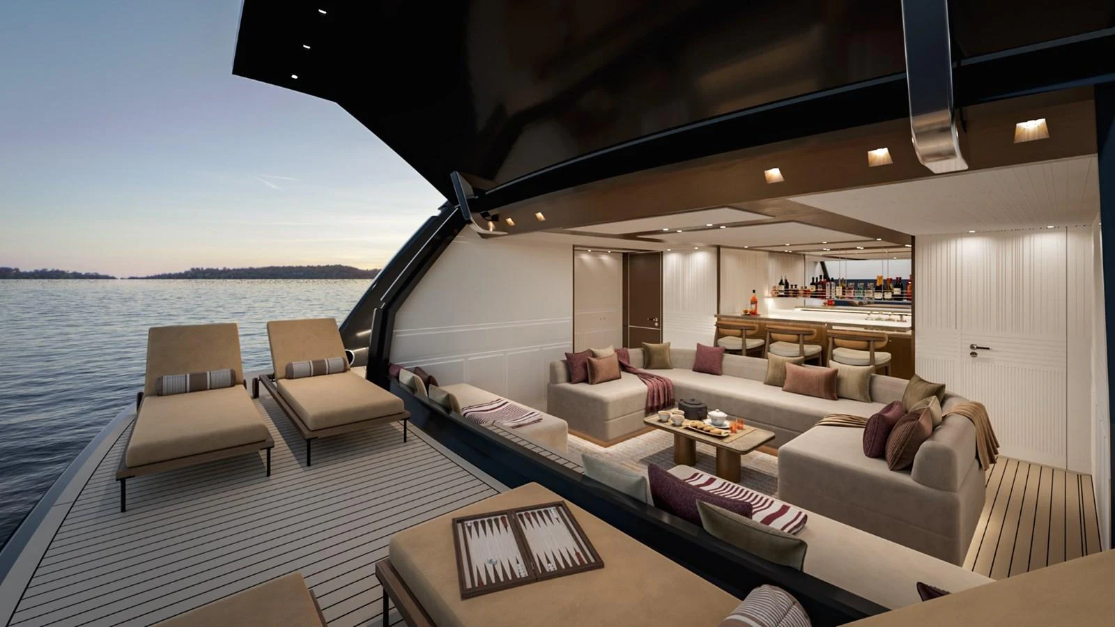 The aft deck offers a luxurious and spacious lounging area with a seamless transition to the interior bar and seating area. aboard KINGSHIP 45M GRAND EXPLORER Yacht for Sale
