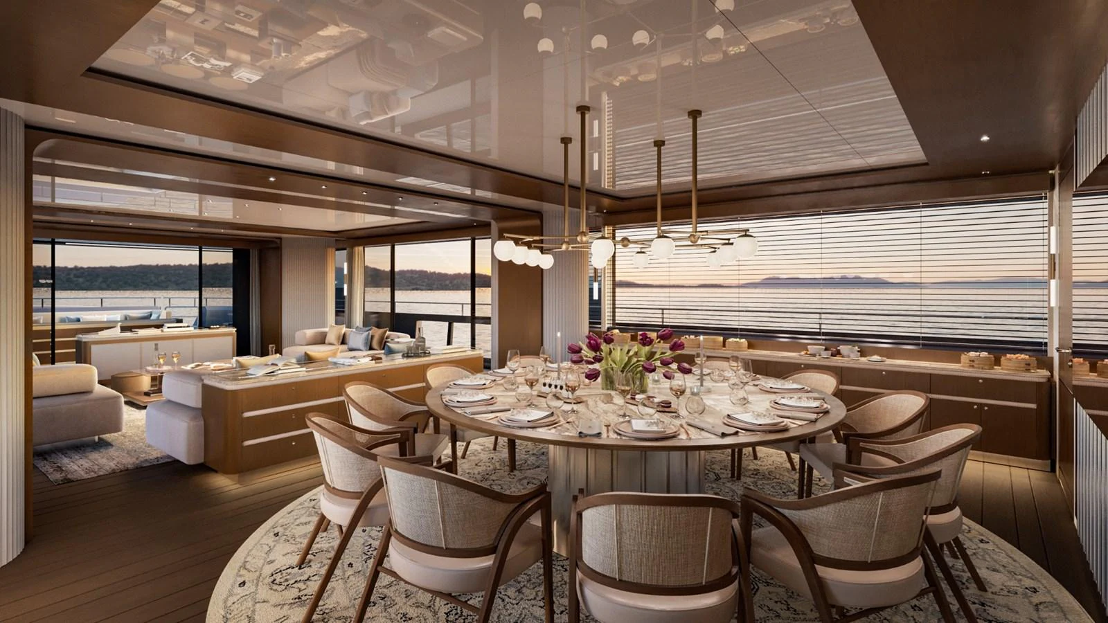 The elegant dining area features a large round table with plush seating and panoramic views through expansive windows. aboard KINGSHIP 45M GRAND EXPLORER Yacht for Sale