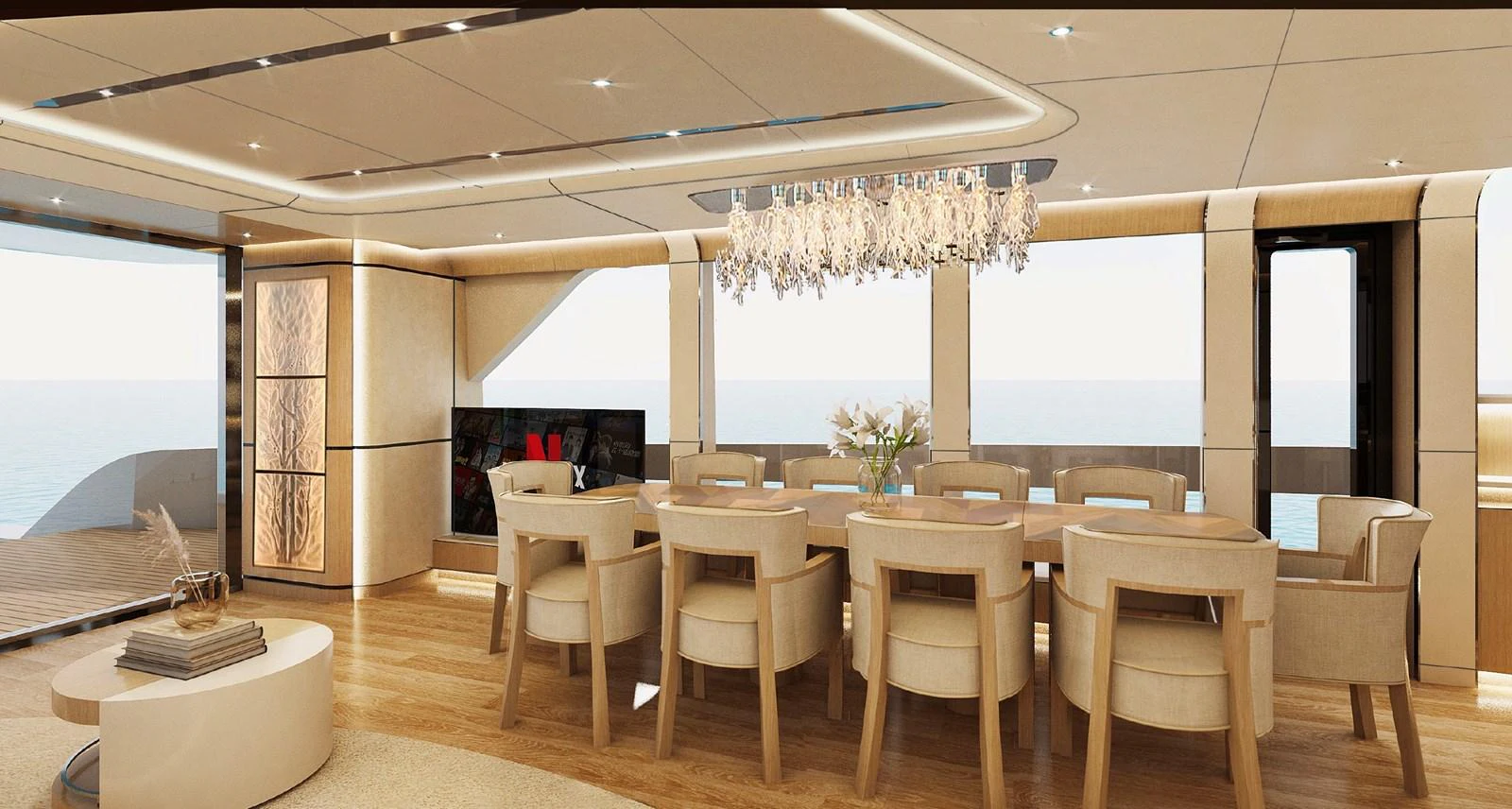 The yacht's dining area features elegant furnishings and a stunning chandelier, creating a luxurious dining experience with a view of the sea. aboard G 24 / 03 Yacht for Sale