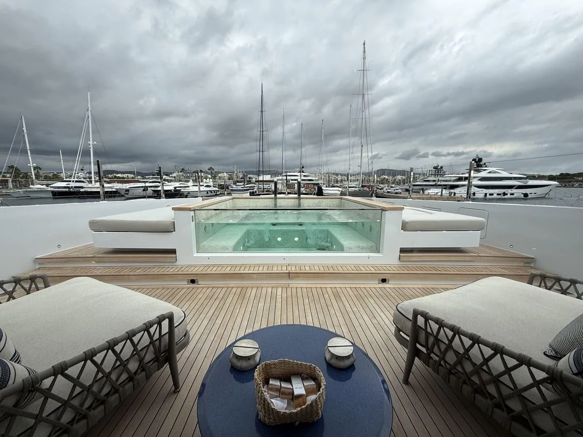 The sundeck features a luxurious jacuzzi surrounded by comfortable seating, perfect for relaxation. aboard PHOENICIAN Yacht for Sale