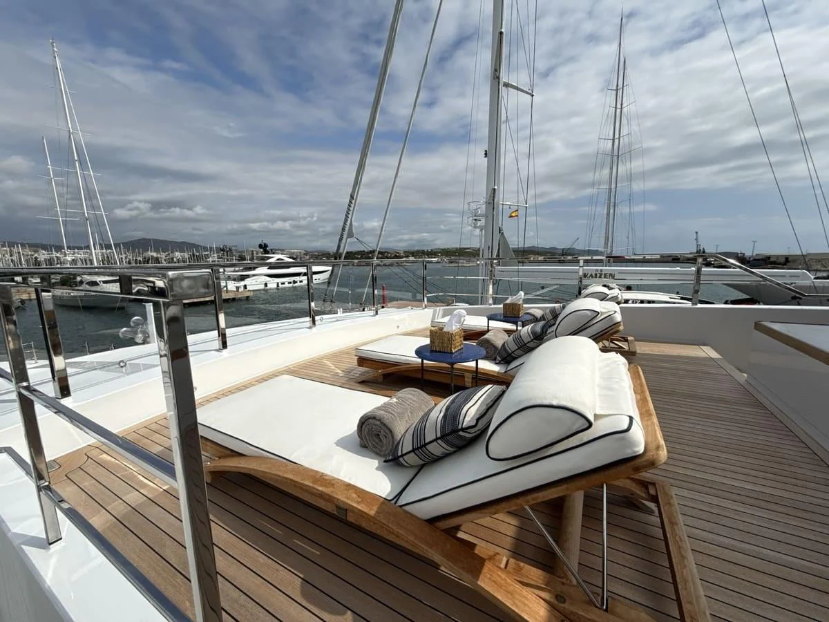 The sundeck offers a luxurious space for relaxation with plush sun loungers and scenic views. aboard PHOENICIAN Yacht for Sale