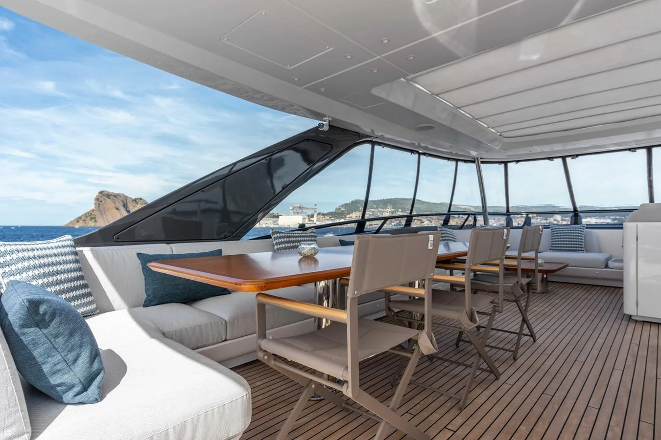 The aft deck offers a spacious and comfortable dining area with stunning ocean views. aboard ST JUDE Yacht for Sale