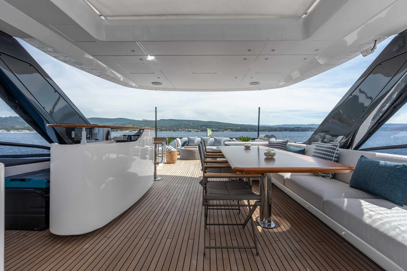 The aft deck offers a spacious and elegant outdoor dining area with panoramic views. aboard ST JUDE Yacht for Sale