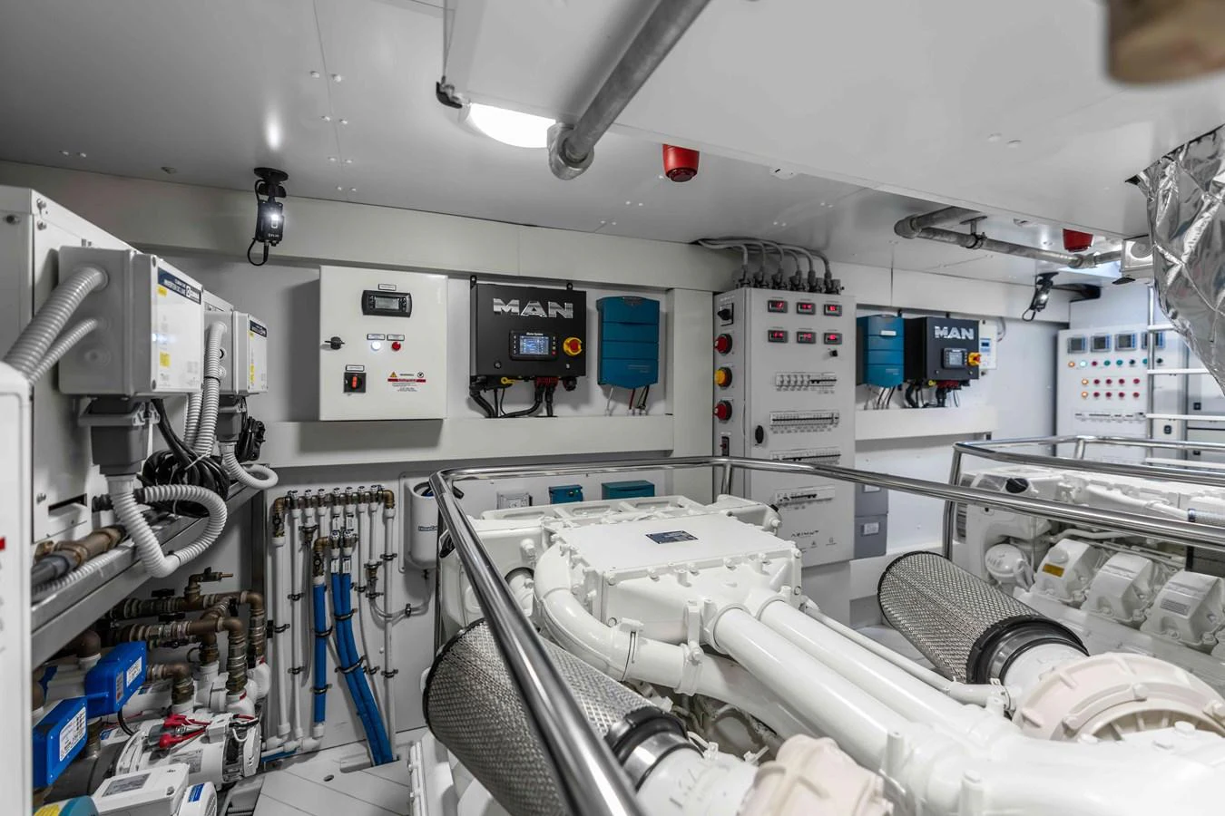 The engine room showcases advanced machinery and control systems, ensuring optimal performance and reliability. aboard ST JUDE Yacht for Sale